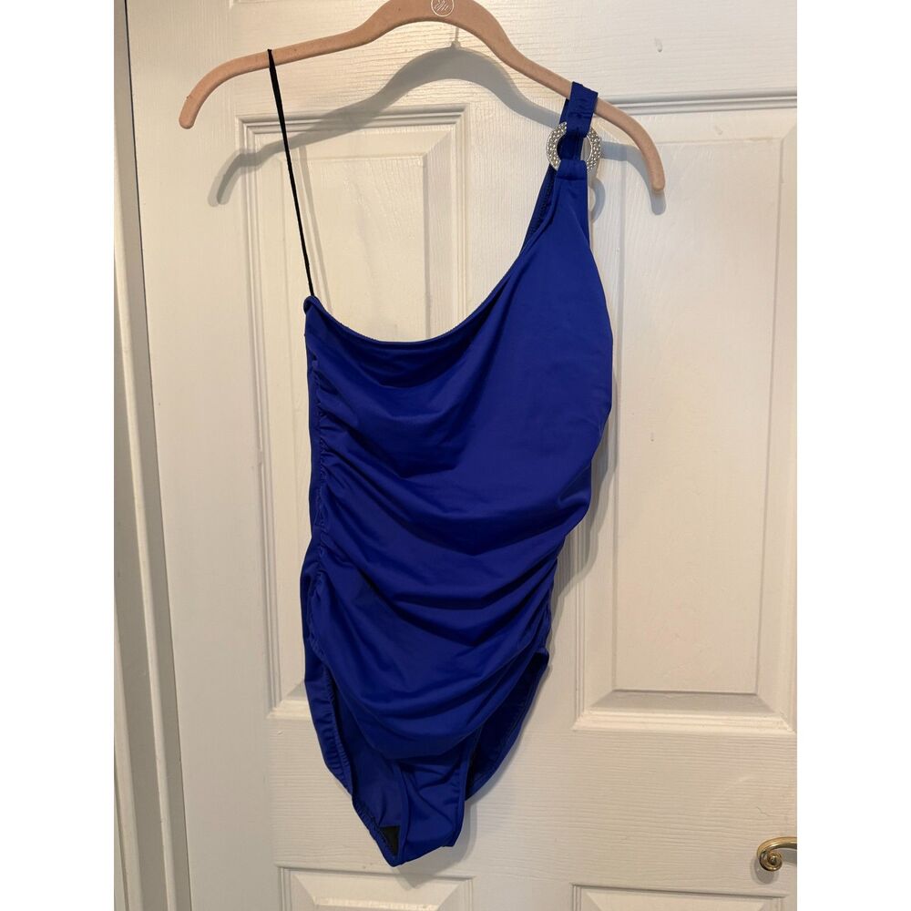 Magic Suit Size 8, One shoulder Blue with silver embellishment , one Piece